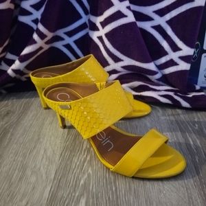 Calvin Klein open toe heels. Size 6.5. Yellow.